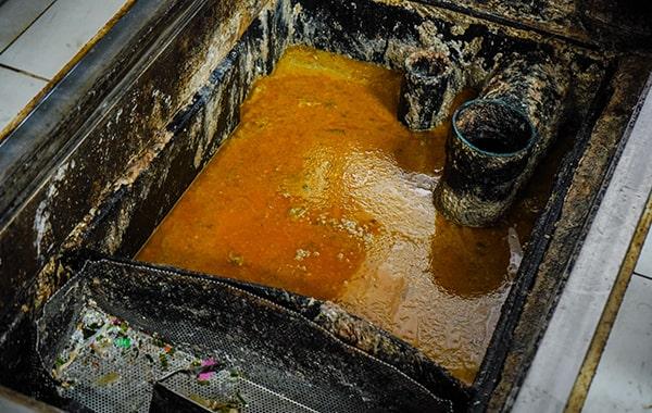 many cities and states have regulations and laws that require regular grease trap cleaning for dining establishments